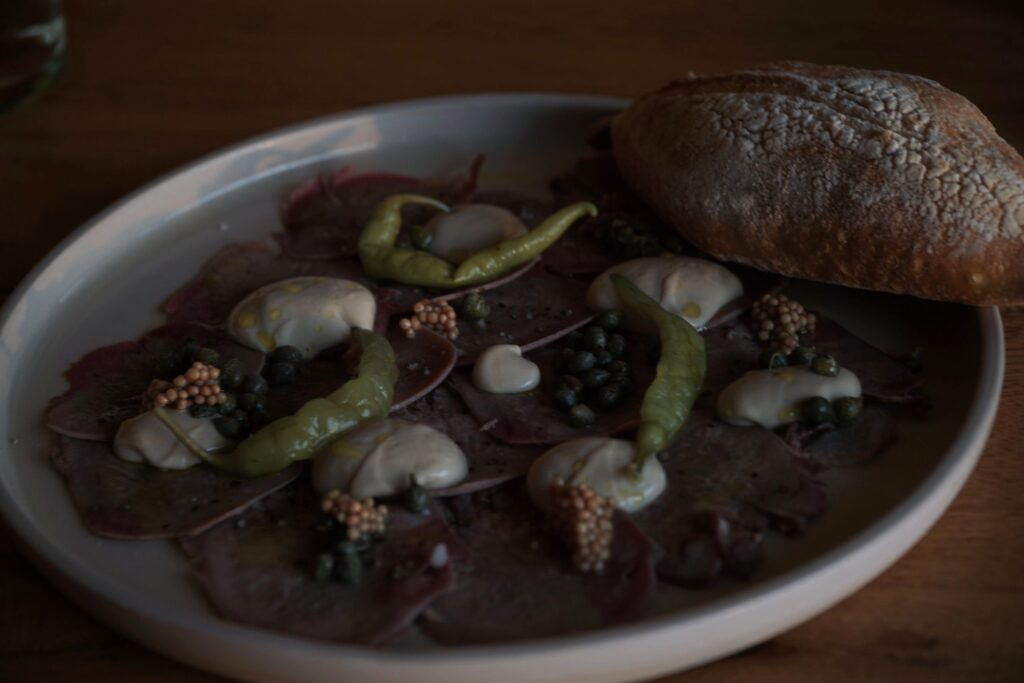 Beef tongue carpaccio at La Bóveda, the Michelin-recognized restaurant at Casona Sforza