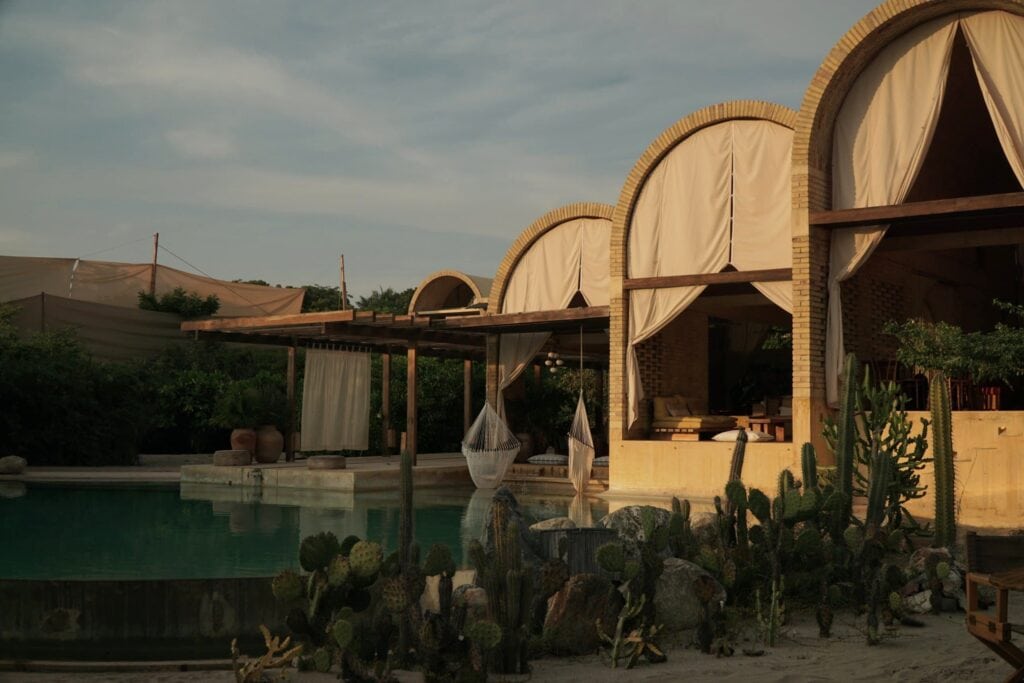 Casona Sforza day pass: brick barrel vaults, pool and cactus garden in Puerto Escondido