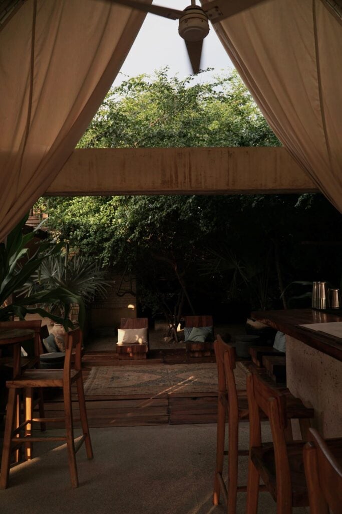 La Bóveda restaurant at Casona Sforza, framed by canvas curtains