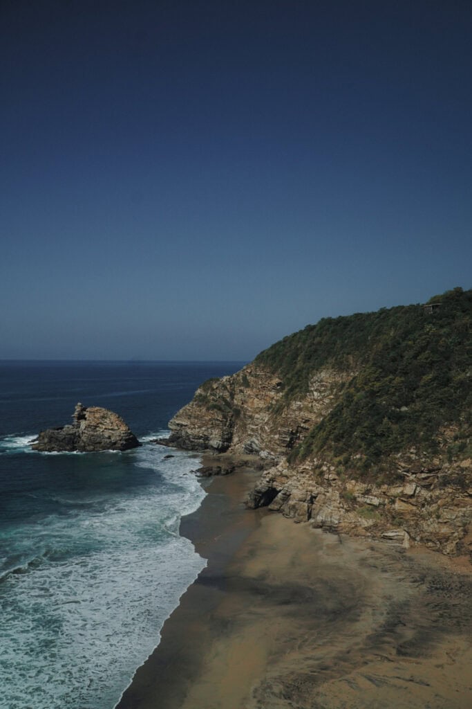 Cliffs and the private beach below La Valise Mazunte, Oaxaca