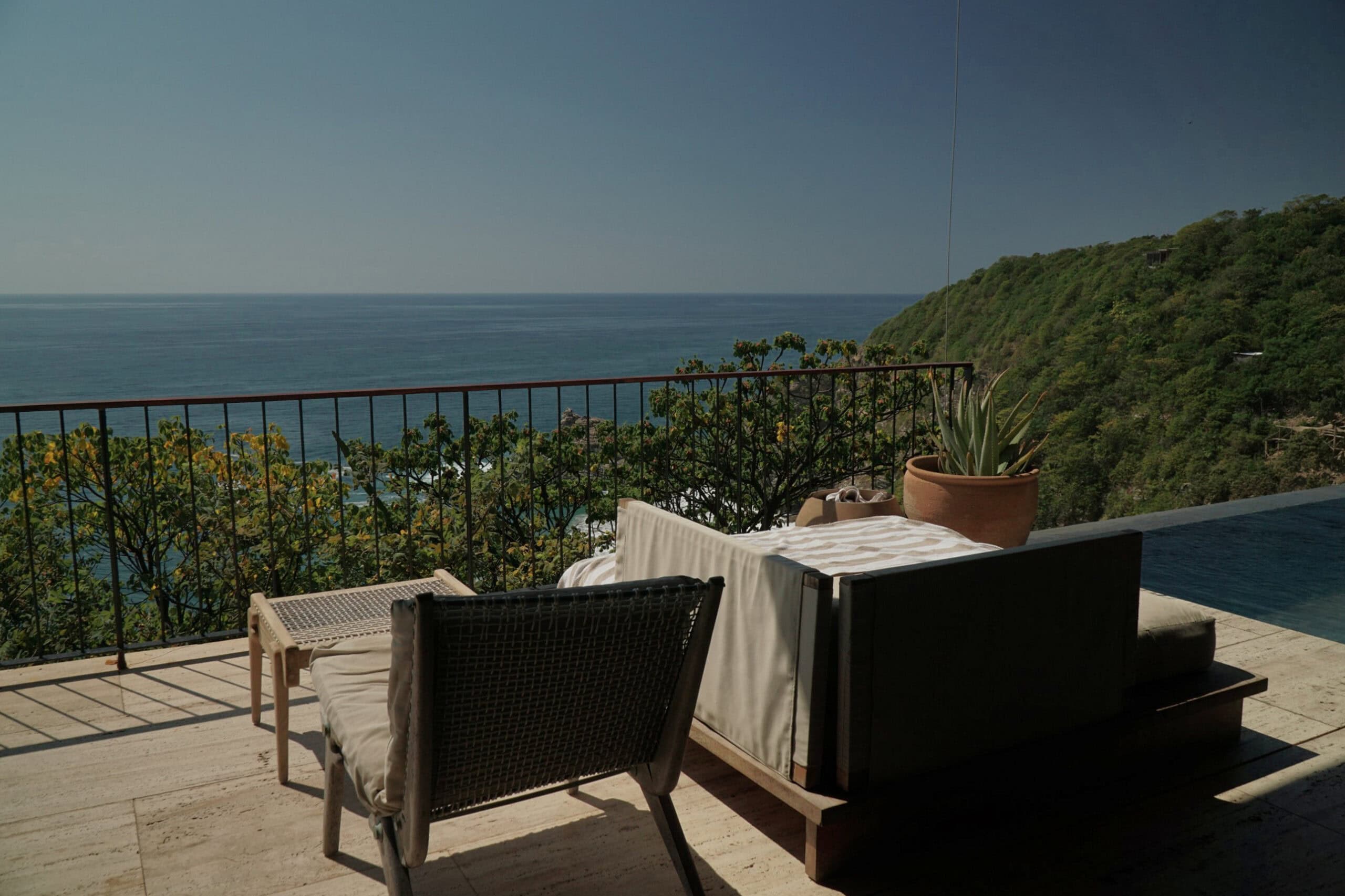Infinity pool and lounger above the Pacific at La Valise Mazunte