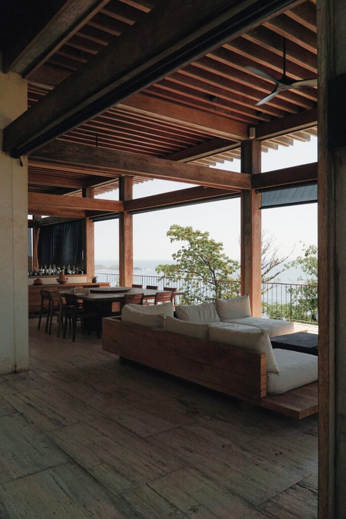 Open-air living and dining room at La Valise Mazunte with ocean views