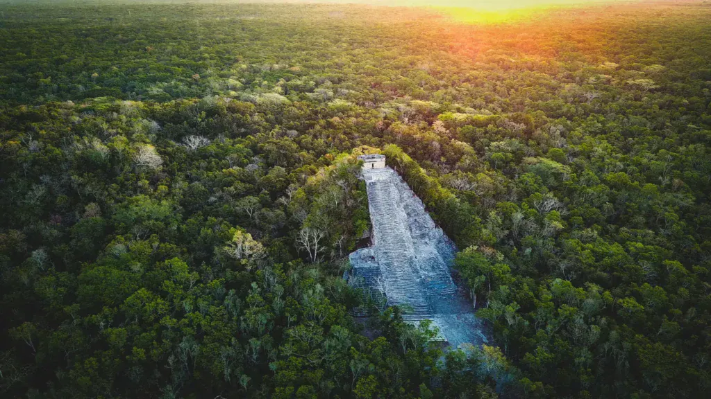 Aerial view of jungle and cenote at Rio Secreto