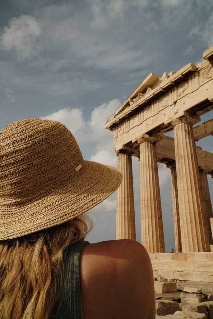 Visiting the Parthenon in a sun hat